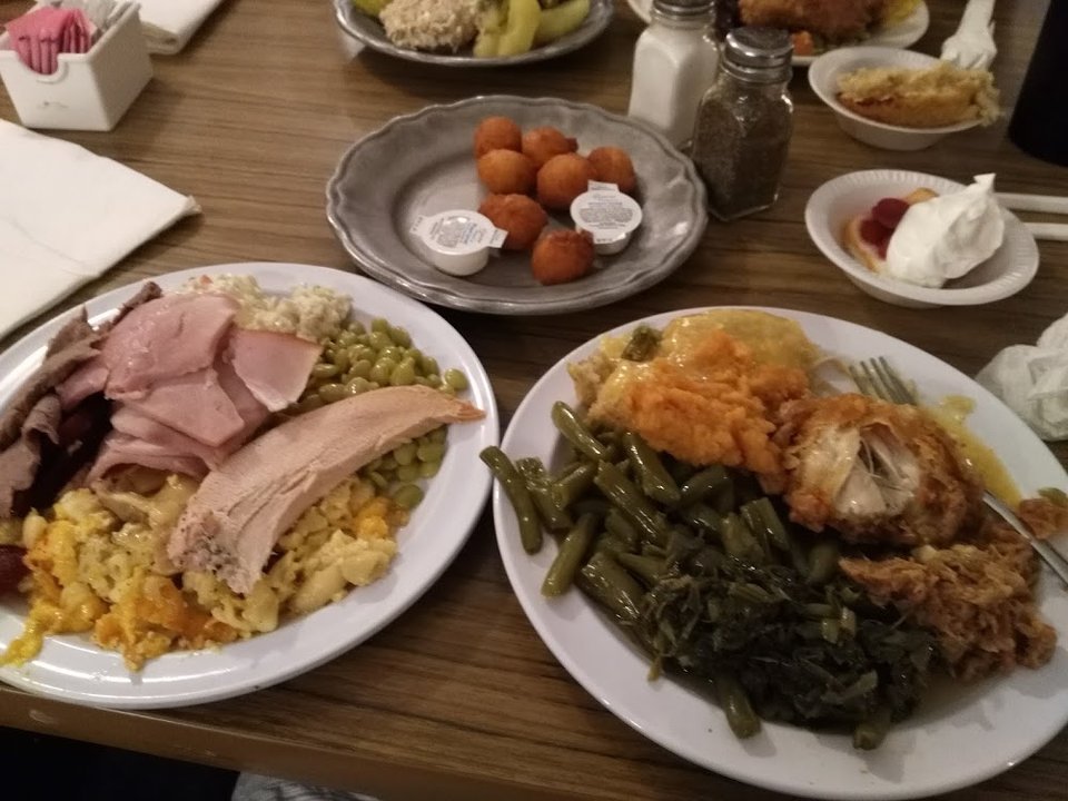 Buffet items arranged for dine-in or takeout.